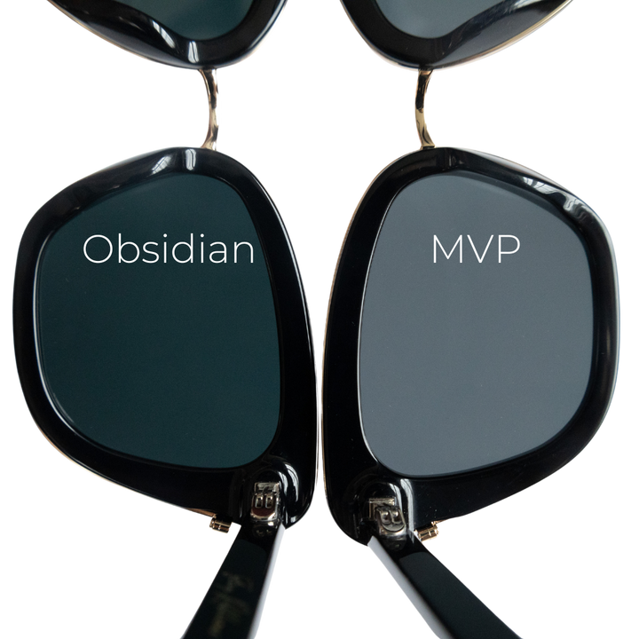 Close up of two Sol Kyst cat eye sunglasses, one with the word "Obsidian" and one with "MVP" on 2 different colors of tinted lenses.