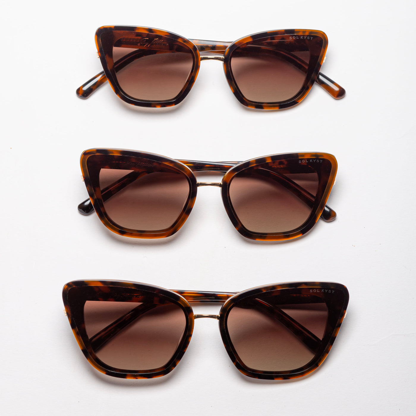 Three pairs of tortoise cat-eye sunglasses with gradient brown lenses, aligned vertically on a white background.