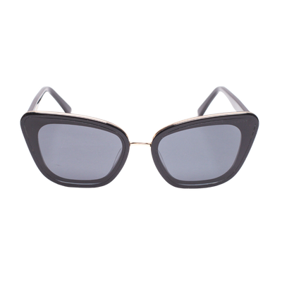 Front view of Sol Kyst women's cat eye sunglasses with black frames and gray-tinted lenses.
