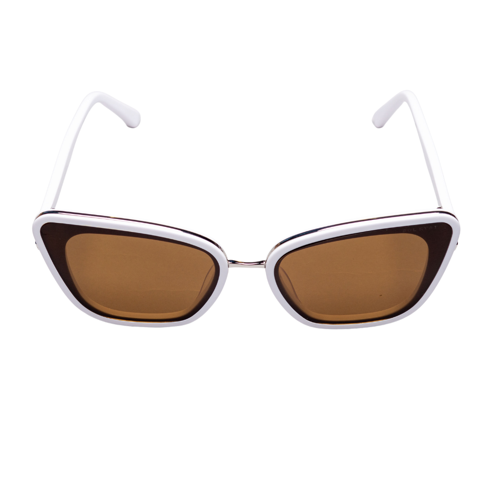 Top angle view of Sol Kyst women's cat eye sunglasses with white frames and brown tinted lenses.